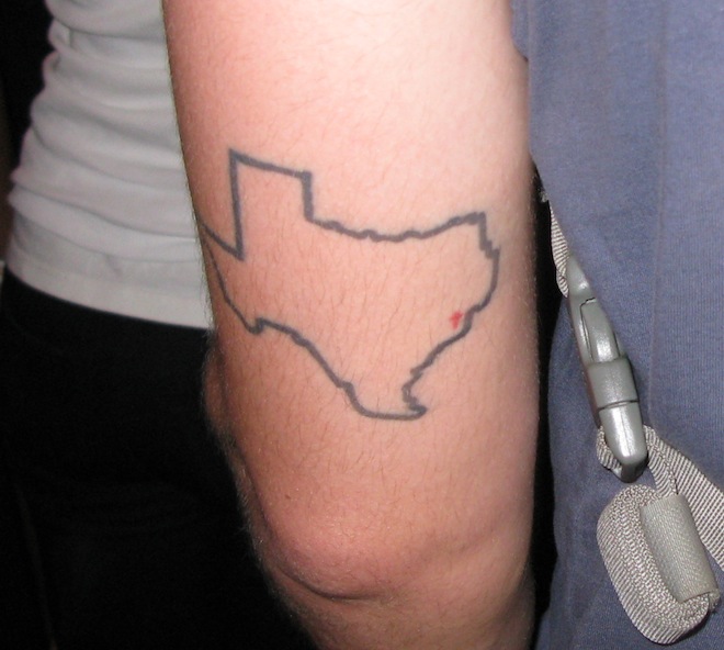 Simple State Of Texas Outline Tattoo On Triceps