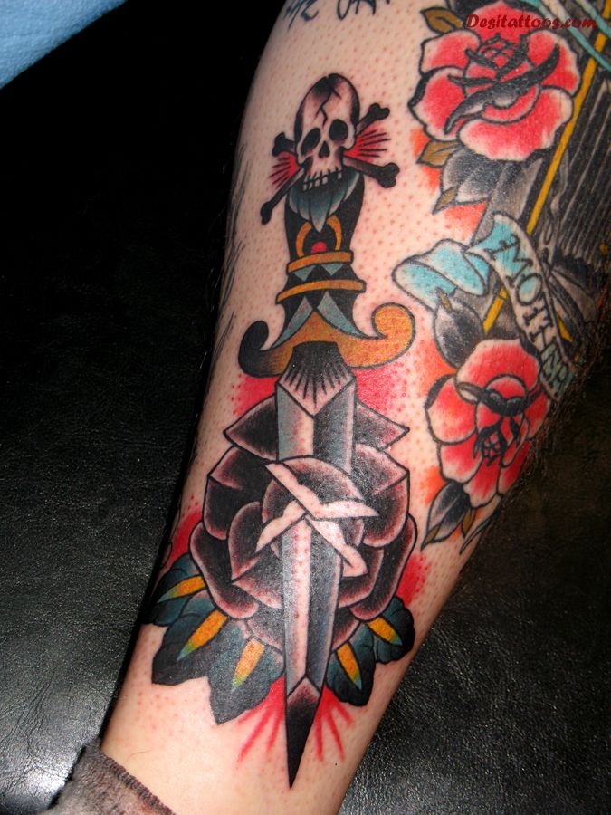 Skull Headed Dagger Knife Traditional Tattoo On Leg