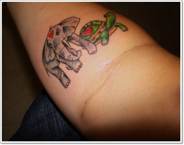 Small Elephant And Tortoise Tattoo On Forearm