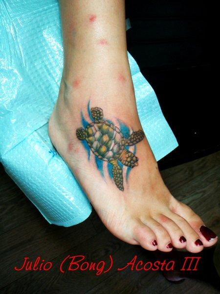 Small Swimming Turtle Color Tattoo On Foot