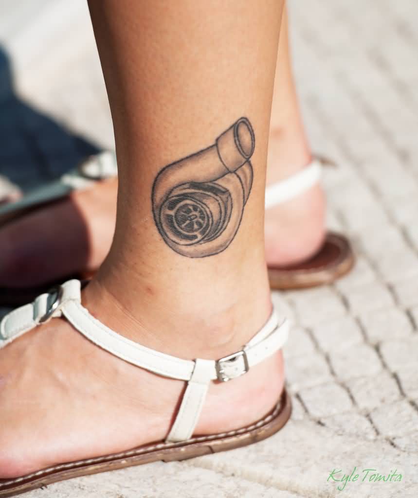 Small Turbo Tattoo On Ankle By Kyle Tomita