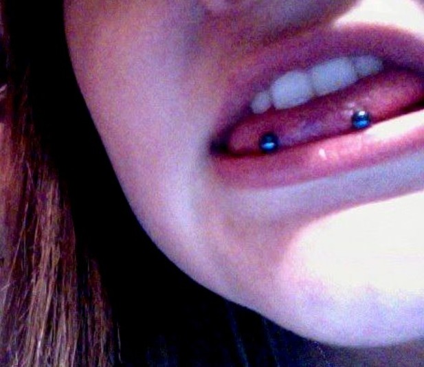 Snake Eyes Piercing With Blue Barbell