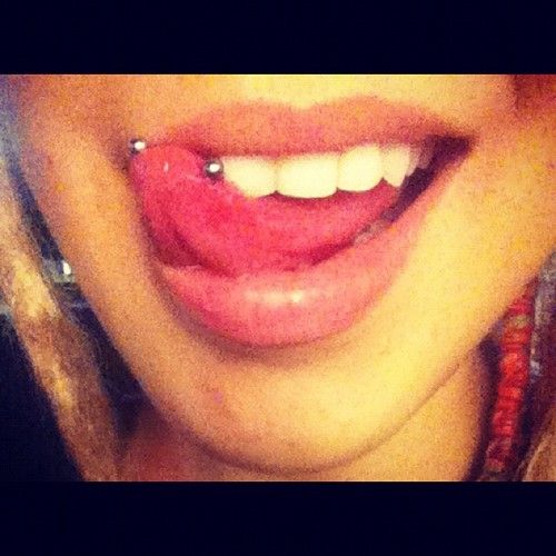 Snake Eyes Piercing With Silver Barbell For Girls