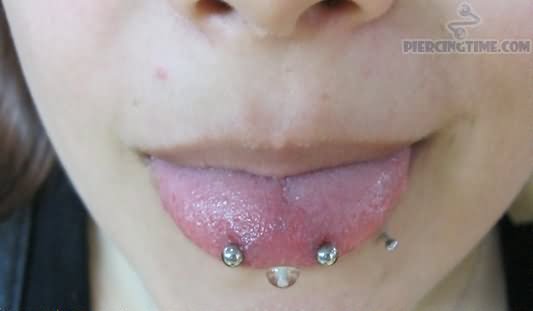 Snake Eyes Piercing With Silver Studs For Girls