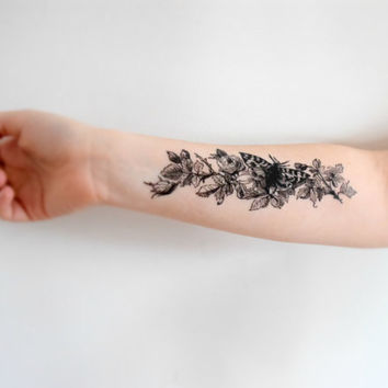 Temporary Butterfly Plant Tattoo On Forearm