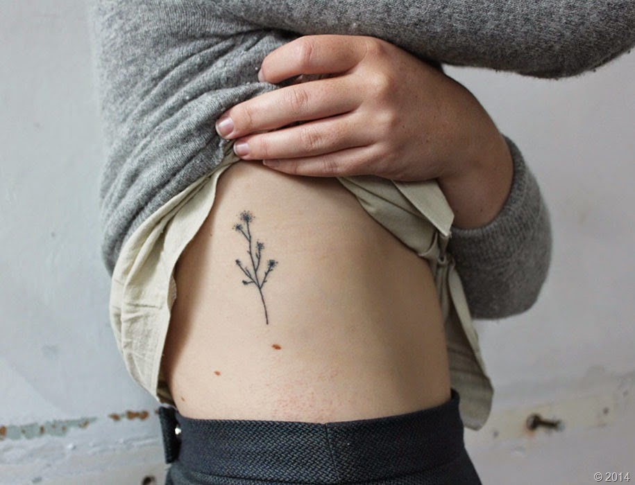 Tiny Plant Tattoo On Side Rib