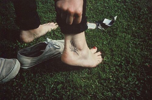 Tiny Simple Plant Tattoo On Ankle