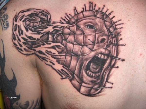 Very Nice Grey Pinhead Face Tattoo On Back Left Shoulder