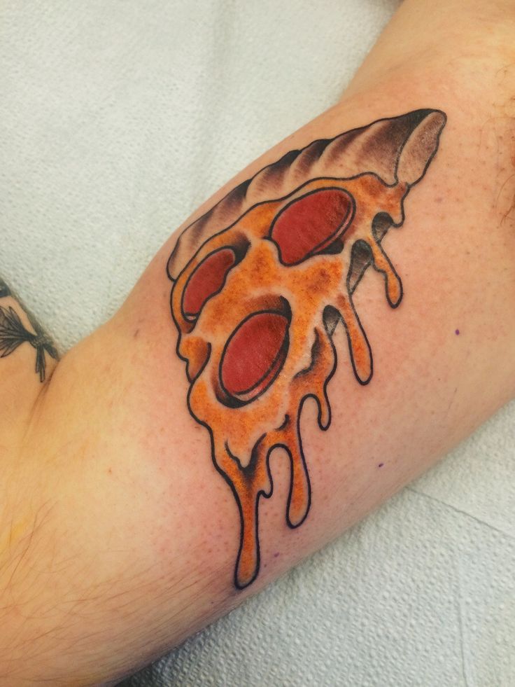 Very Nice Melting Pizza Piece Tattoo On Biceps