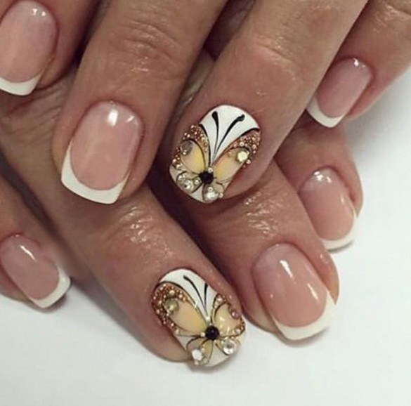 White Base Nails With Butterfly Nail Art With Rhinestones