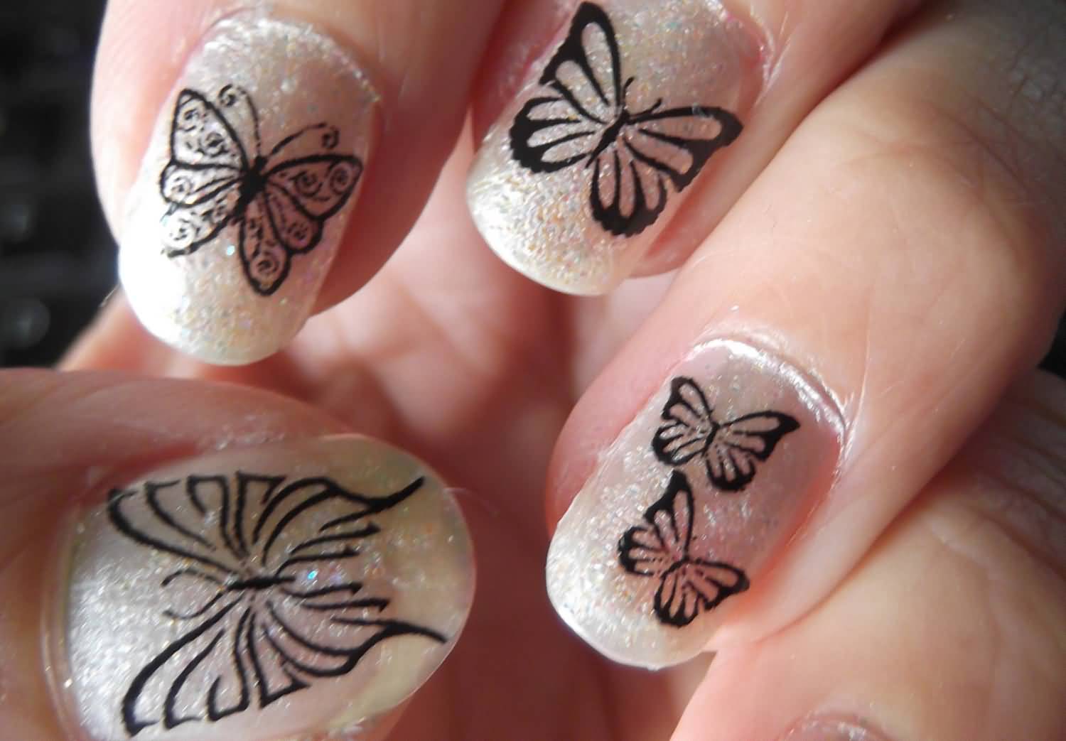 White Gel Nails With Black Butterflies Nail Art