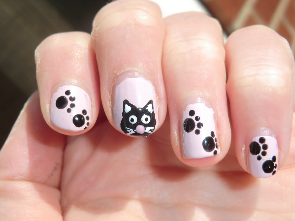 White Nails With Black Cat Face And Paw Prints Design Idea