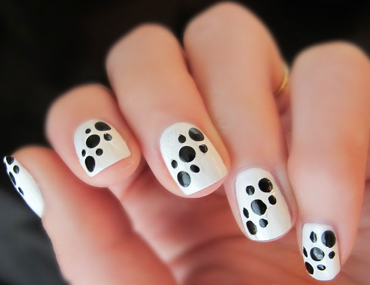White Nails With Black Polka Dots Nail Art Idea