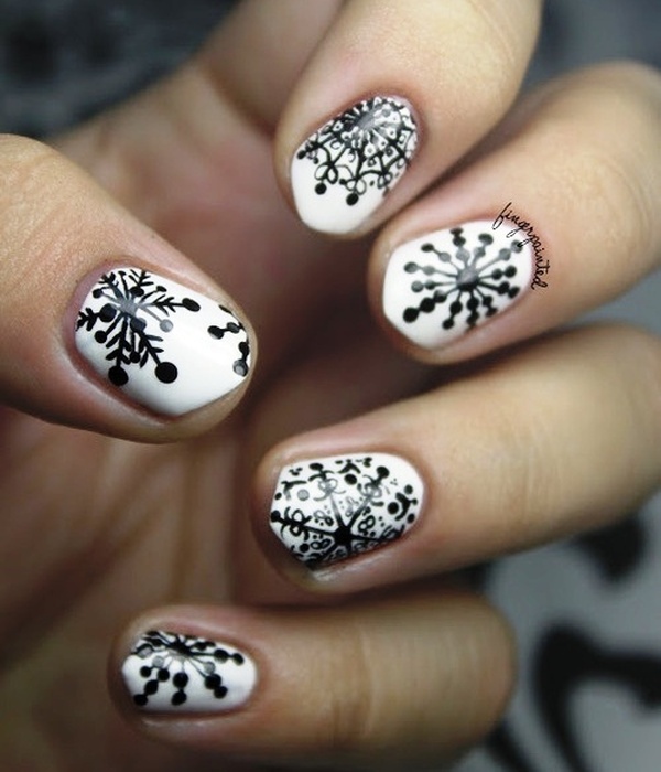 White Nails With Black Snowflakes Design Idea