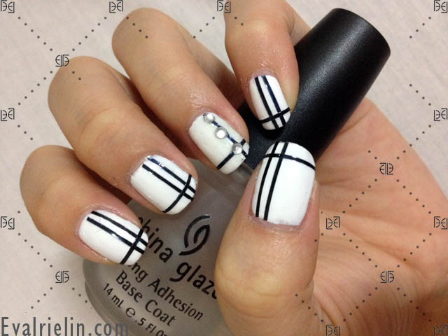 White Nails With Black Stripes And Rhinestones Design Nail Art