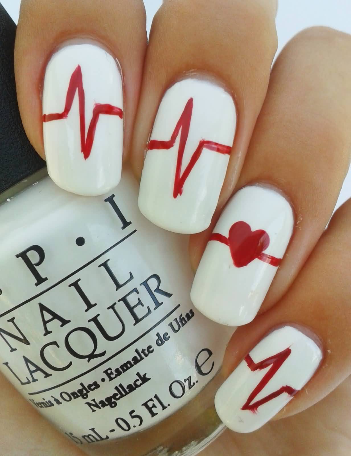 White Nails With Red Heartbeat Nail Art