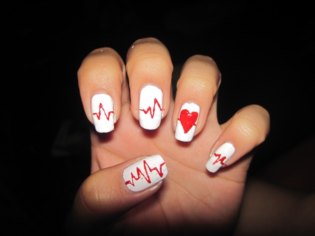 White Nails With Red Heartbeat Nail Design Idea