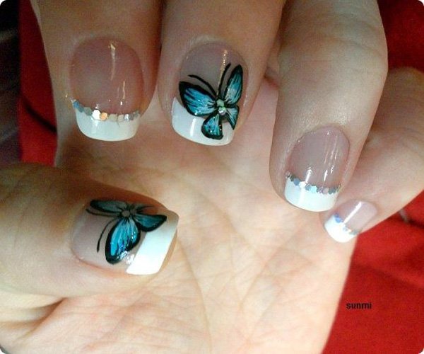 White Tip Nails With Blue Butterflies Nail Design Idea