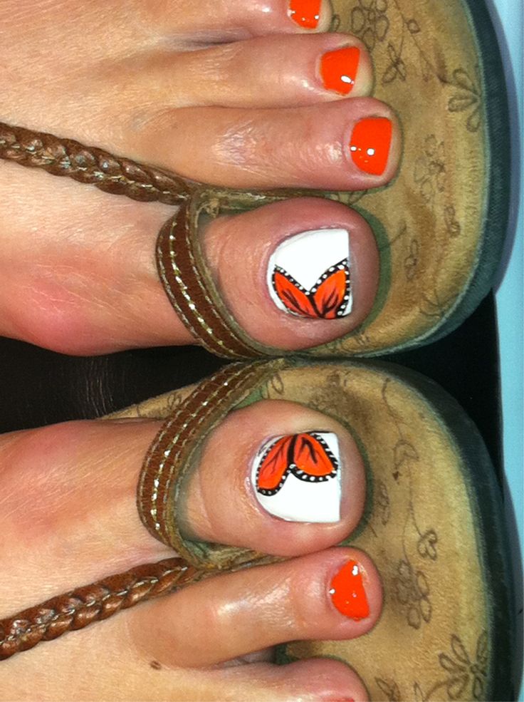 White Toe Nails With Orange Butterfly Nail Art