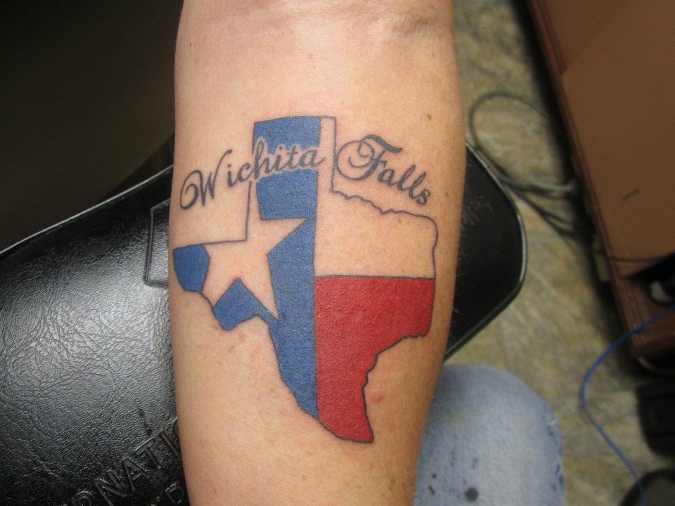 Wichita Falls Texas Flag In Map Tattoo On Forearm.