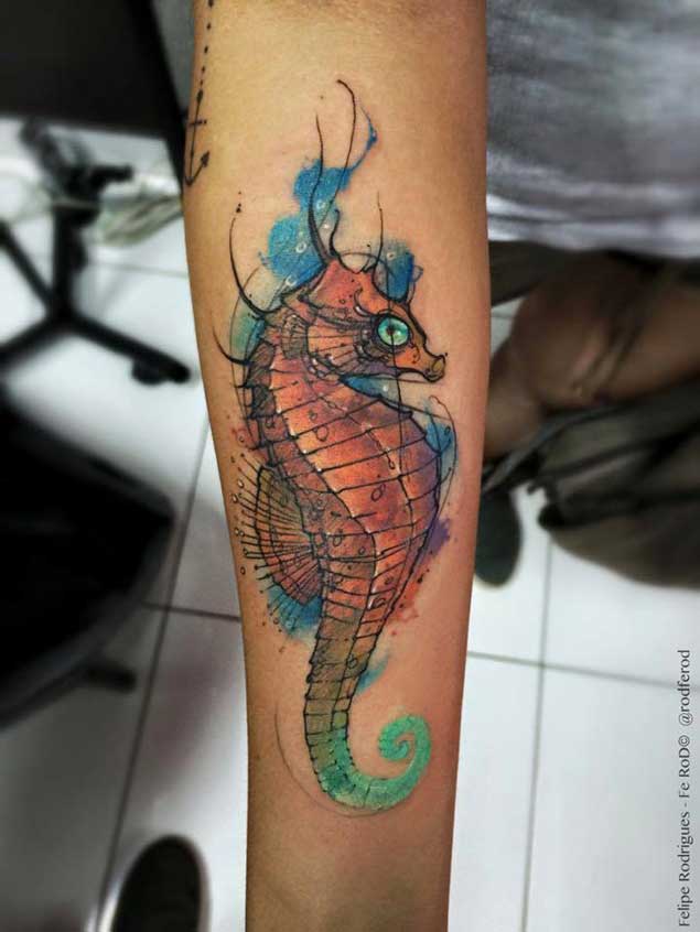 Wonderful Watercolor Seahorse Tattoo On Forearm