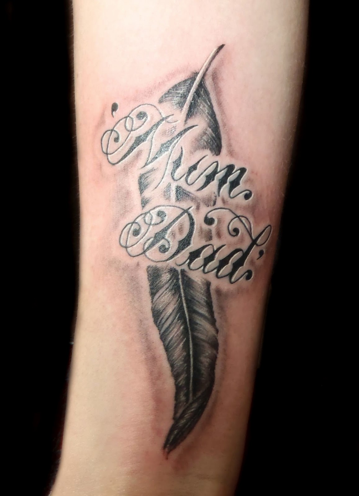 Amazing Feather Mom And Dad Tattoo On Arm