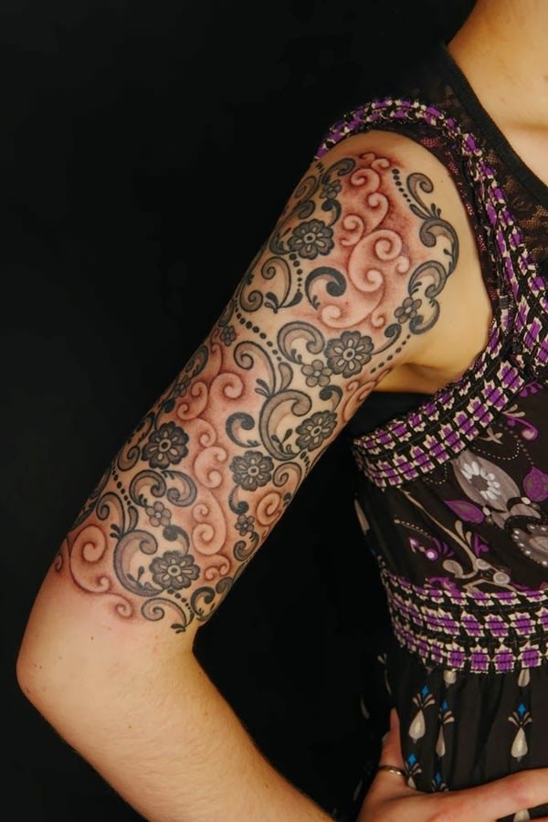 Attractive Flower Paisley Pattern Tattoo On Right Half Sleeve