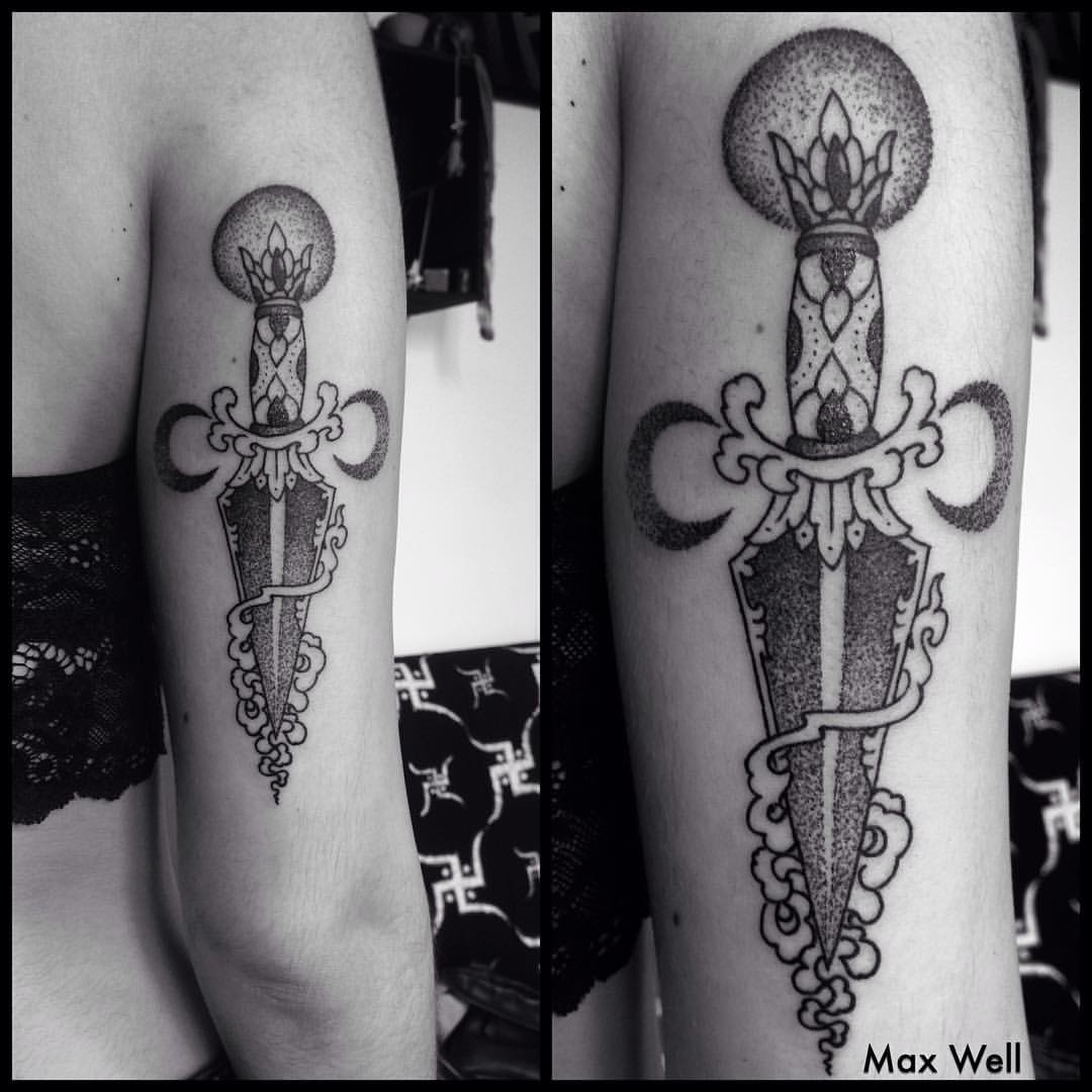 Attractive Grey Dagger Tattoo On Triceps