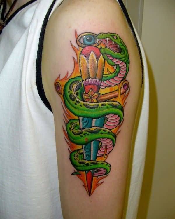 Attractive Snake With Dagger Colored Tattoo On Left Shoulder