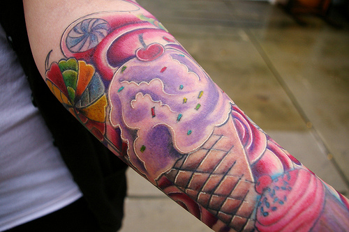 Awesome Colorful Ice Cream Cone Tattoo On Arm Sleeve