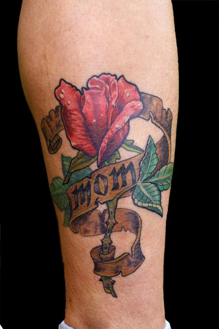 Awesome Flower With Mom Banner Tattoo On Leg