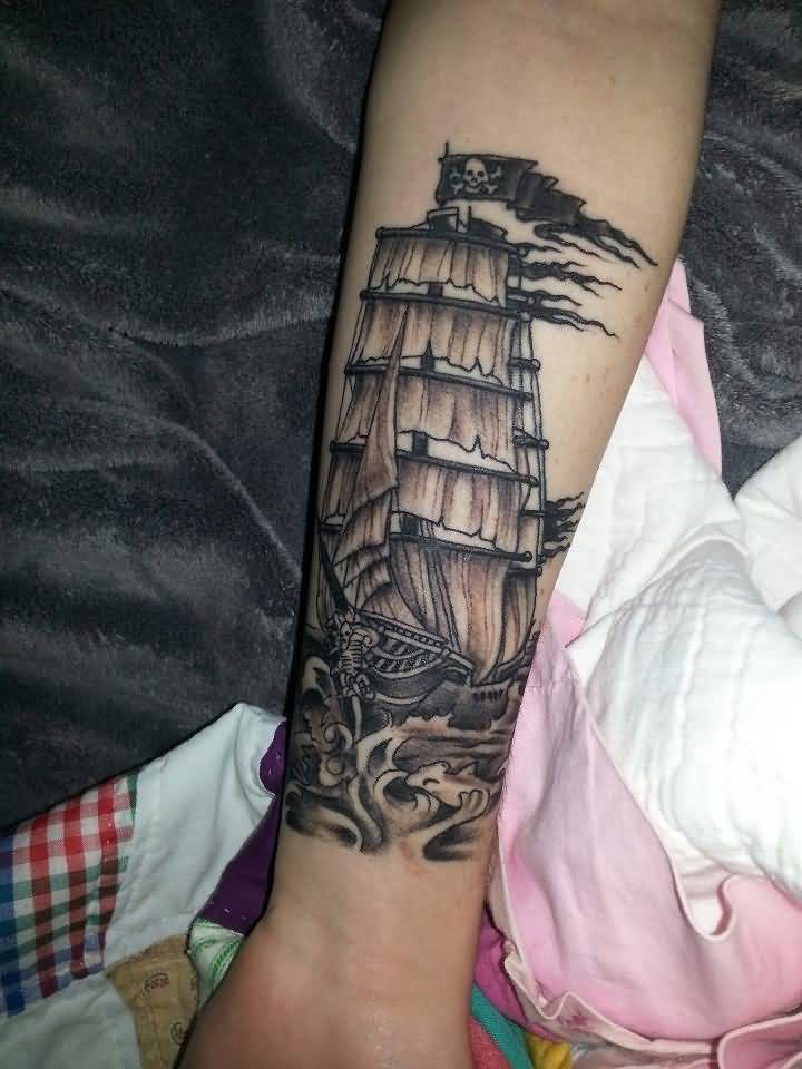 Awesome Jolly Roger Ship Tattoo On Forearm
