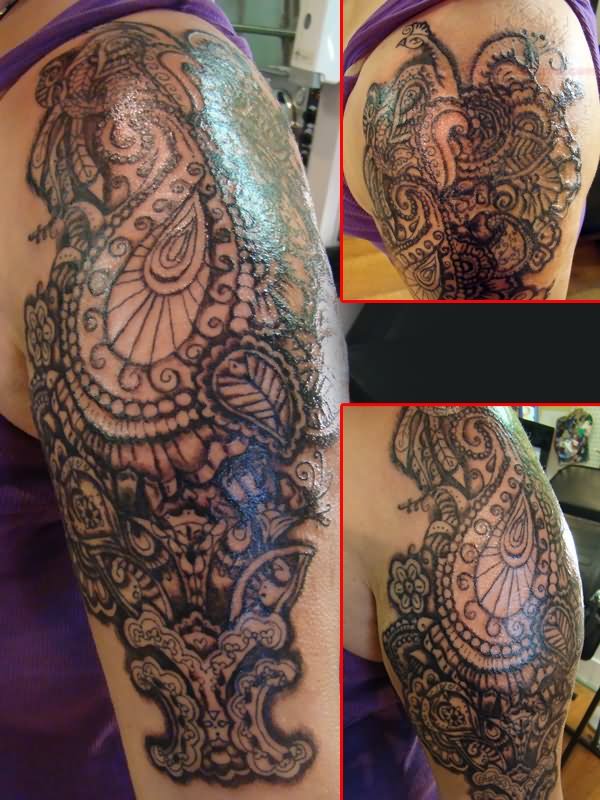 Awesome Paisley Pattern Tattoo On Left Half Sleeve