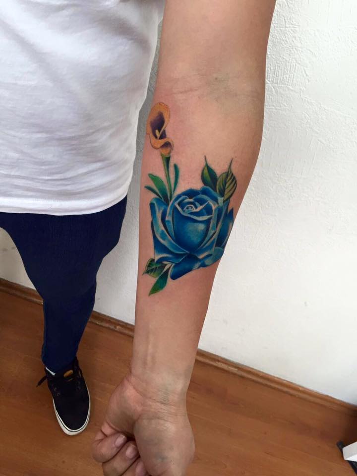 Beautiful Blue Rose Tattoo On Left Forearm
