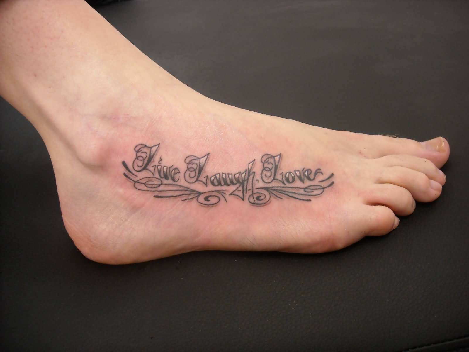 Beautiful Live Laugh Love Tattoo On Foot