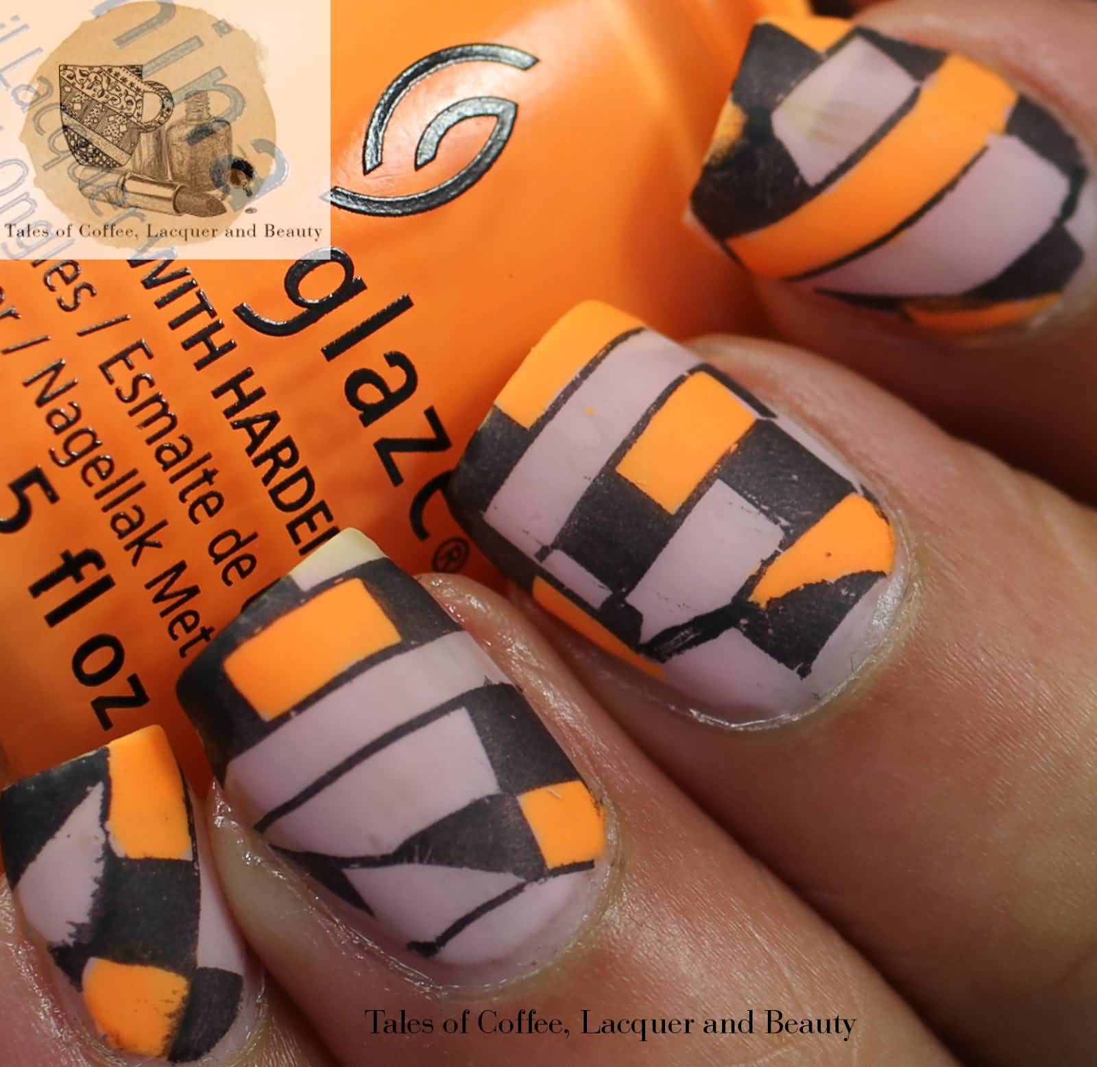 Black And Orange Negative Space Nail Art Design Idea