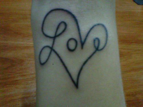 Black Love Heart Tattoo On Wrist