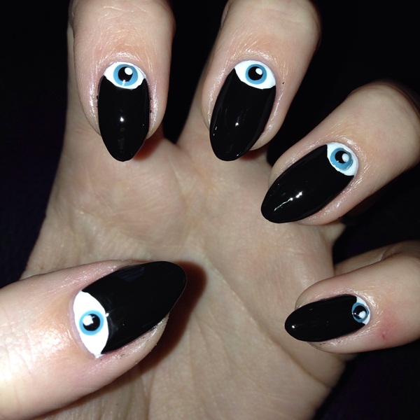 Black Nails With Half Moon Eye Design Nail Art