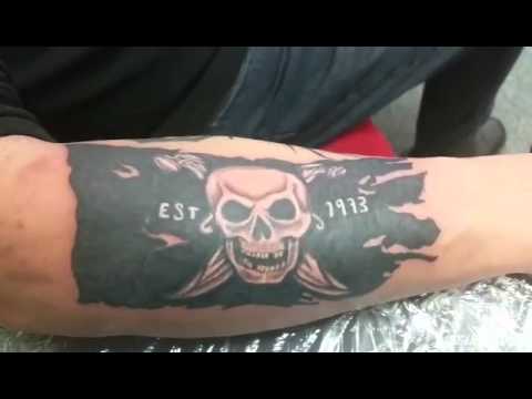 Black Pirate Flag Tattoo On Arm Sleeve