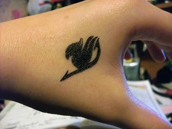 Black Small Fairy Tail Tattoo On Hand