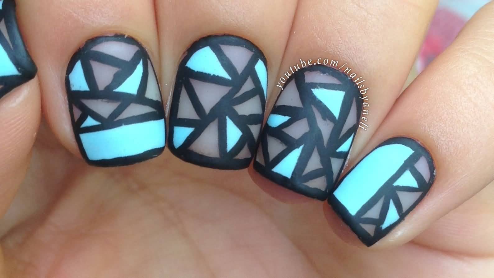 Geometric Blue And Black Negative Space Nail Design