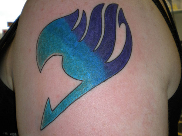 Blue And Purple Fairy Tail Symbol Tattoo On Left Shoulder