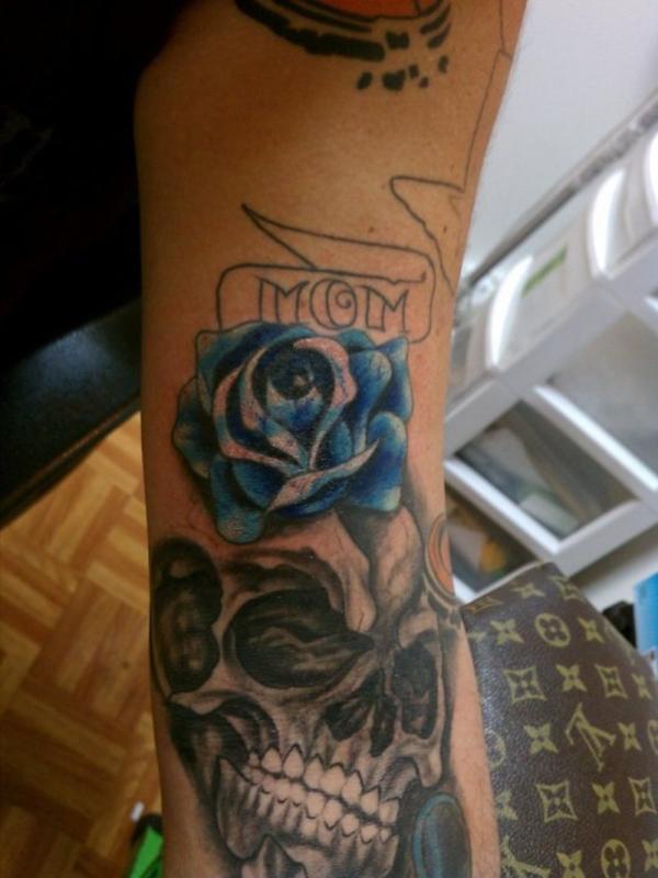 Blue Rose With Skull And Mom Banner Tattoo