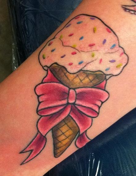 Bow And Ice Cream Cone Tattoo On Arm