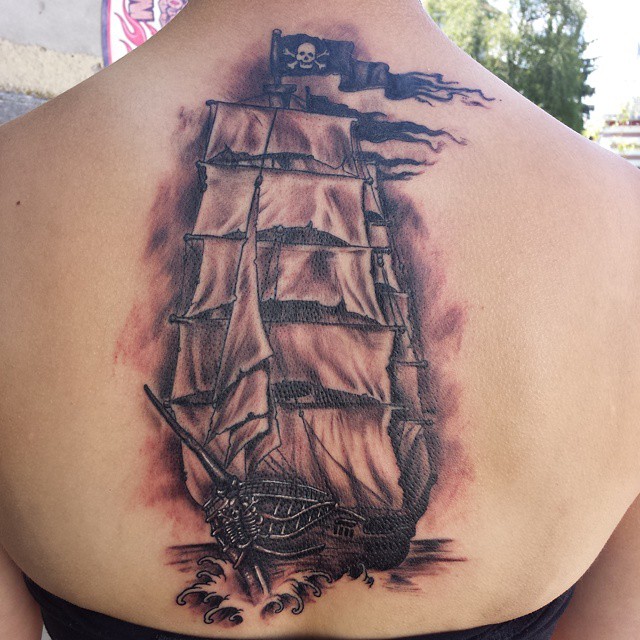 Brilliant Grey Jolly Roger Ship Tattoo On Upper Back