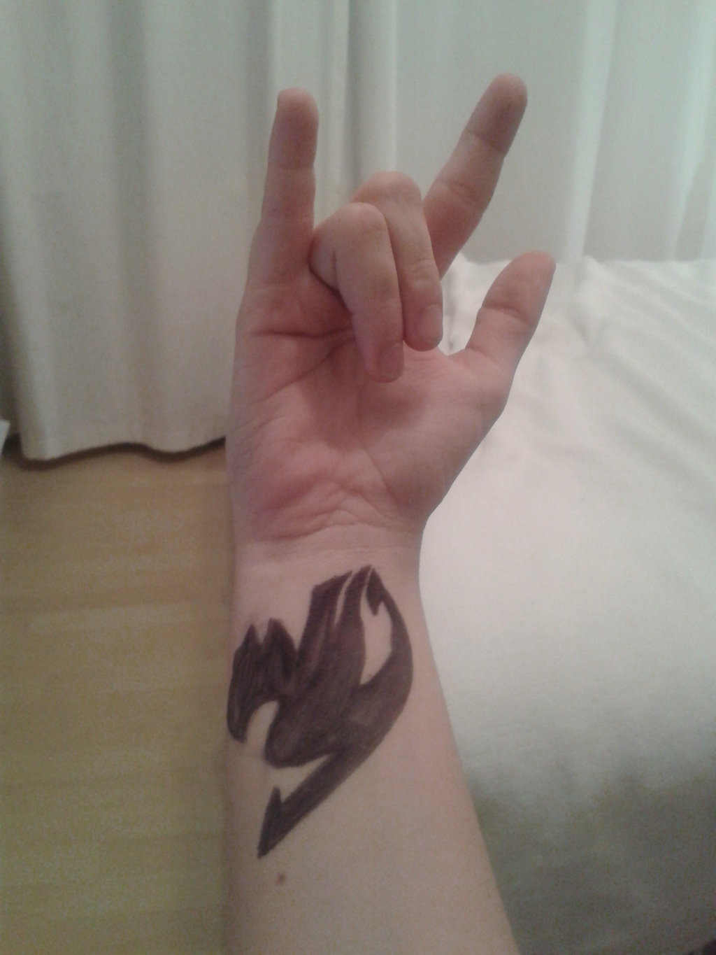 Brown Fairy Tail Tattoo On Wrist By XxkathrinxX