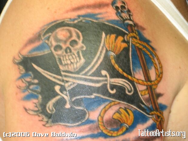 Colored Jolly Roger Flag Tattoo On Right Shoulder