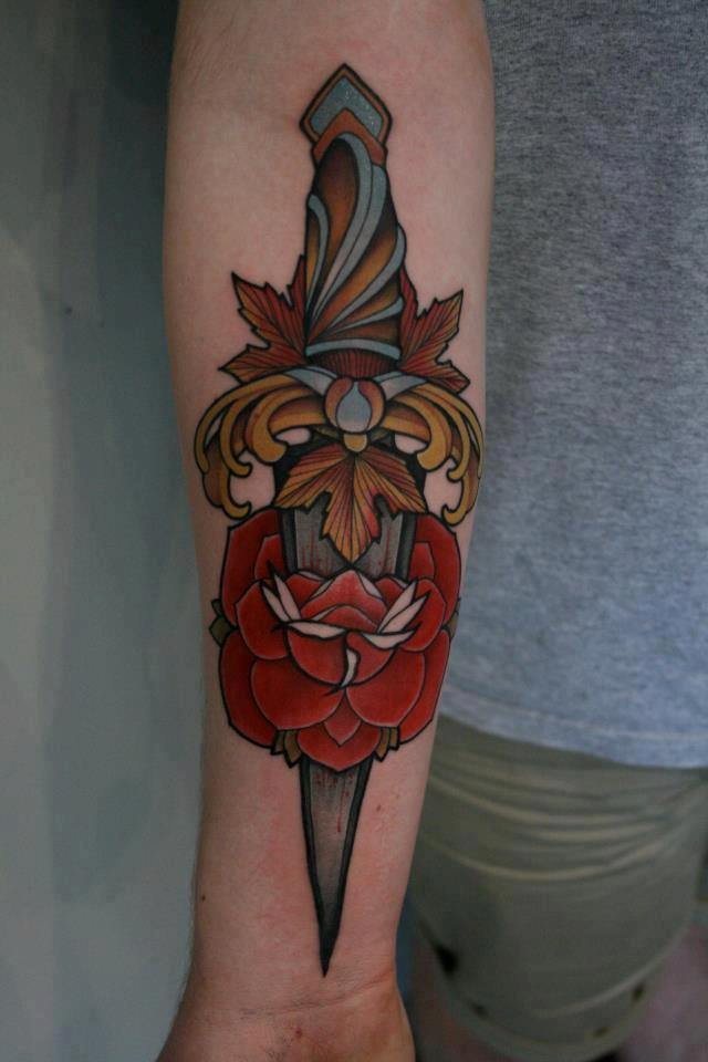 Cool Dagger And Rose Tattoo On Forearm