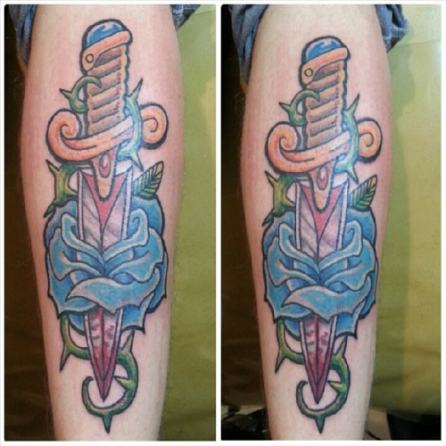 Cool Dagger With Blue Rose Tattoo