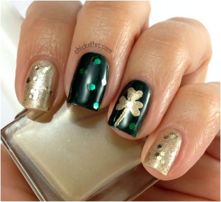 Dark Green Nails With Gold Shamrock Leaf Nail Art Design Idea